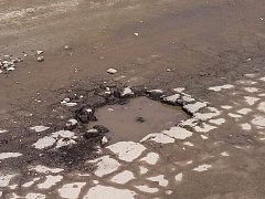 Реализации программы по ремонту сельских дорог в действии 